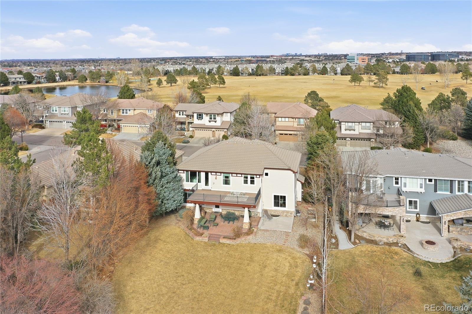8967 Hunters Way Highlands Ranch, CO 80129 - Photo 45 of 50 a picture of city view with lake view