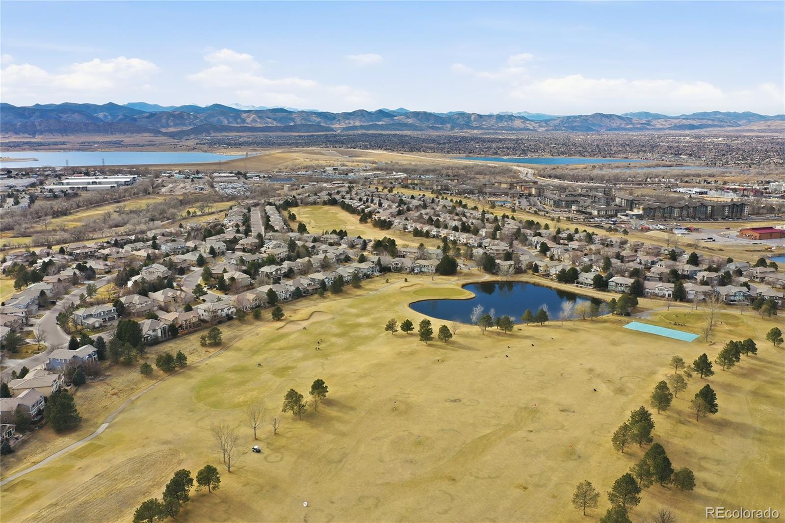 8967 Hunters Way Highlands Ranch, CO 80129 - Photo 46 of 50 a view of lake and mountain