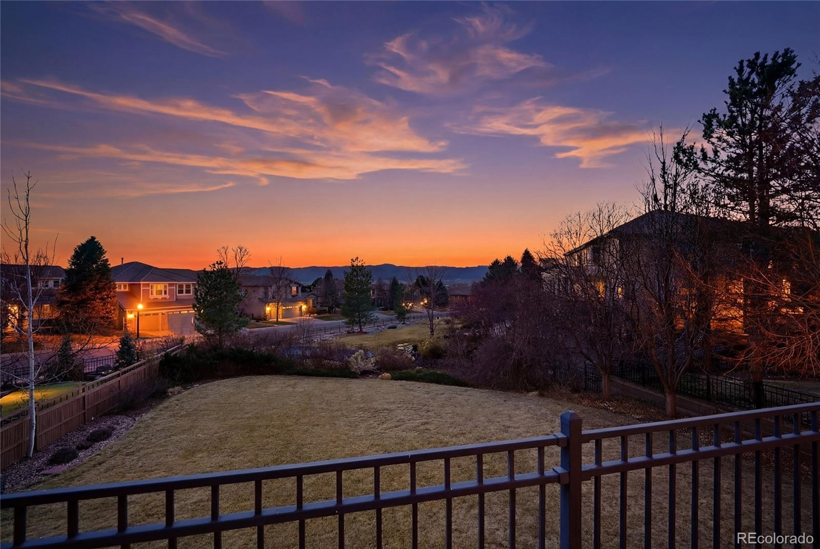 8967 Hunters Way Highlands Ranch, CO 80129 - Photo 9 of 50 a view of a street