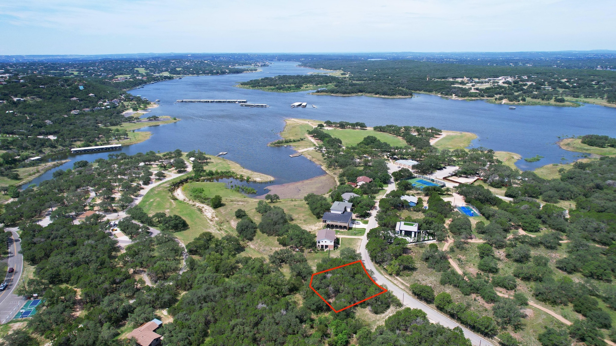 6719 Bar K Ranch Road Lago Vista, TX 78645 - Photo 1 of 36 an aerial view of a residential houses with outdoor space and trees