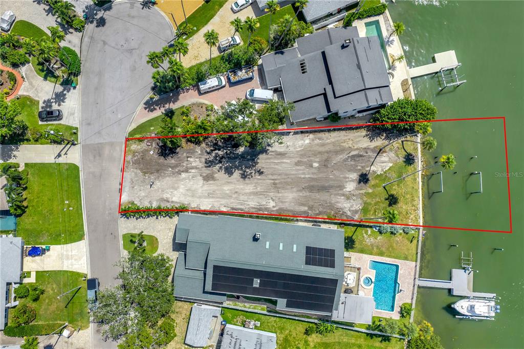 315 10th Avenue North Indian Rocks Beach, FL 33785 - Photo 3 of 13 an aerial view of a house with a swimming pool