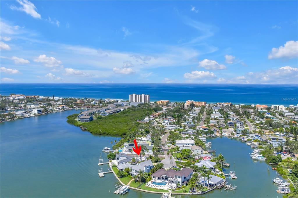 315 10th Avenue North Indian Rocks Beach, FL 33785 - Photo 7 of 13 a view of a lake with a mountain