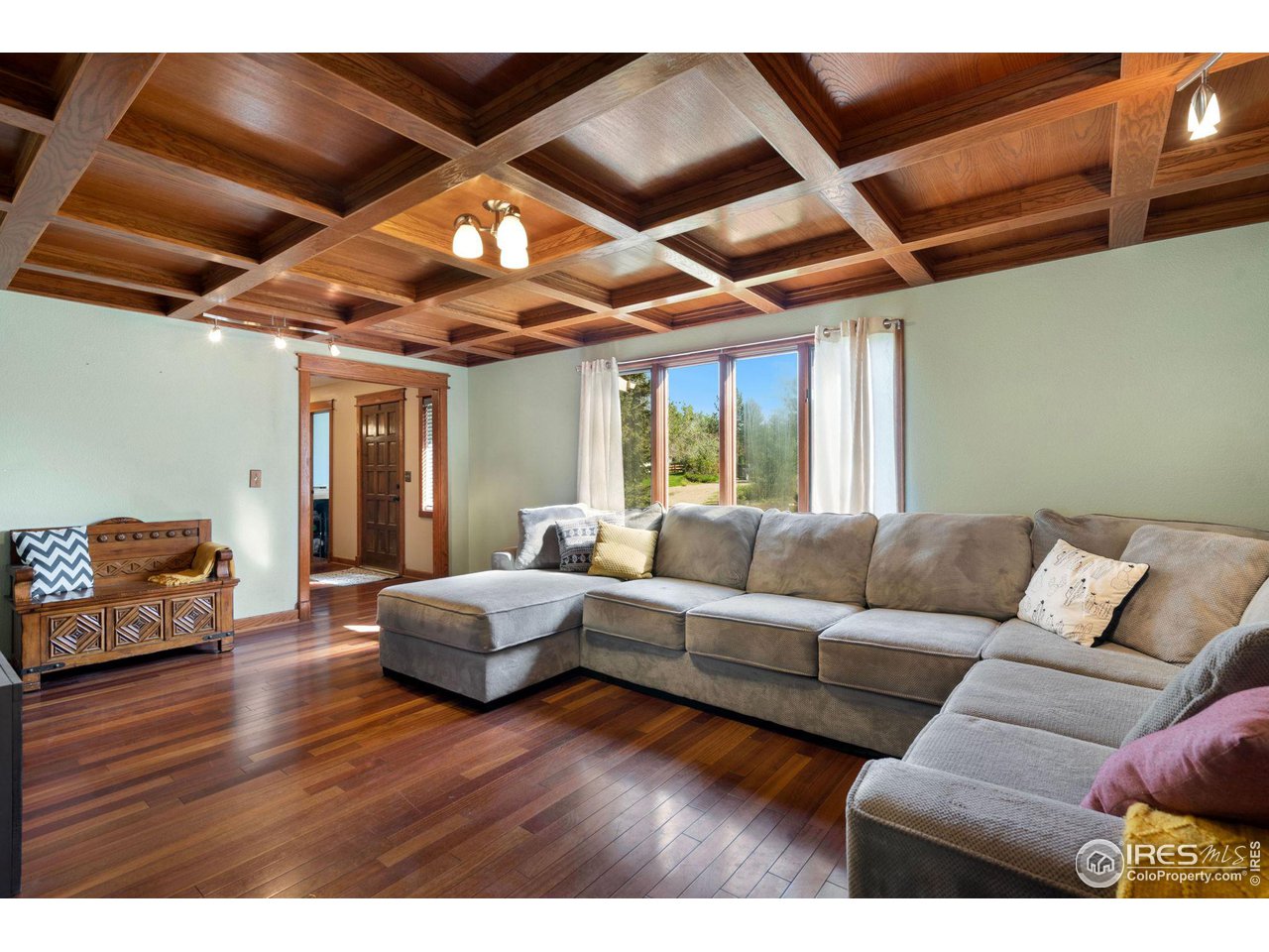 921 East Ridgecrest Road Fort Collins, CO 80524 - Photo 3 of 32 Custom coffered ceiling and hardwood floors