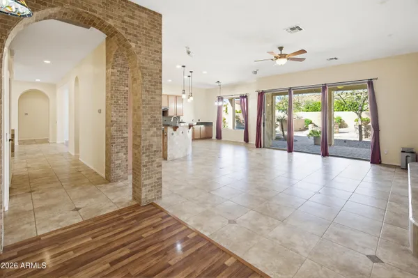 a view of livingroom with fireplace workspace and a fireplace