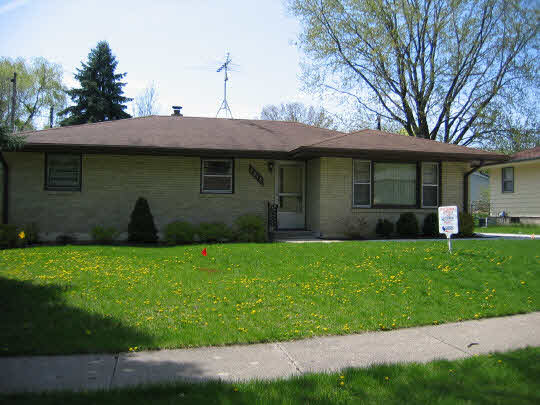 4815 Mohawk Road Rockford, IL 61107 - Photo 1 of 1 a view of a house with backyard and garden