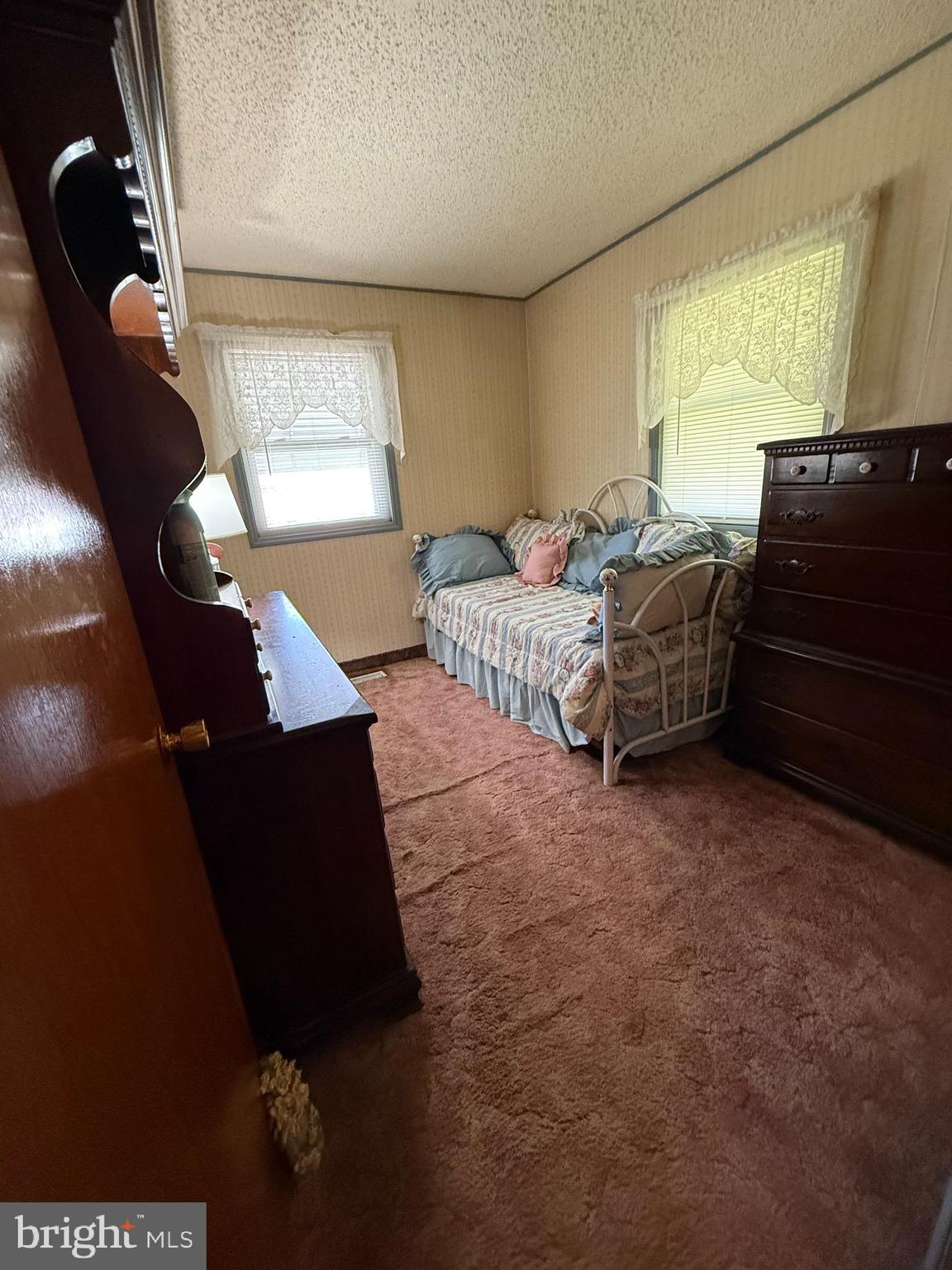 12018 Academy Road Philadelphia, PA 19154 - Photo 12 of 24 a living room with furniture and a window