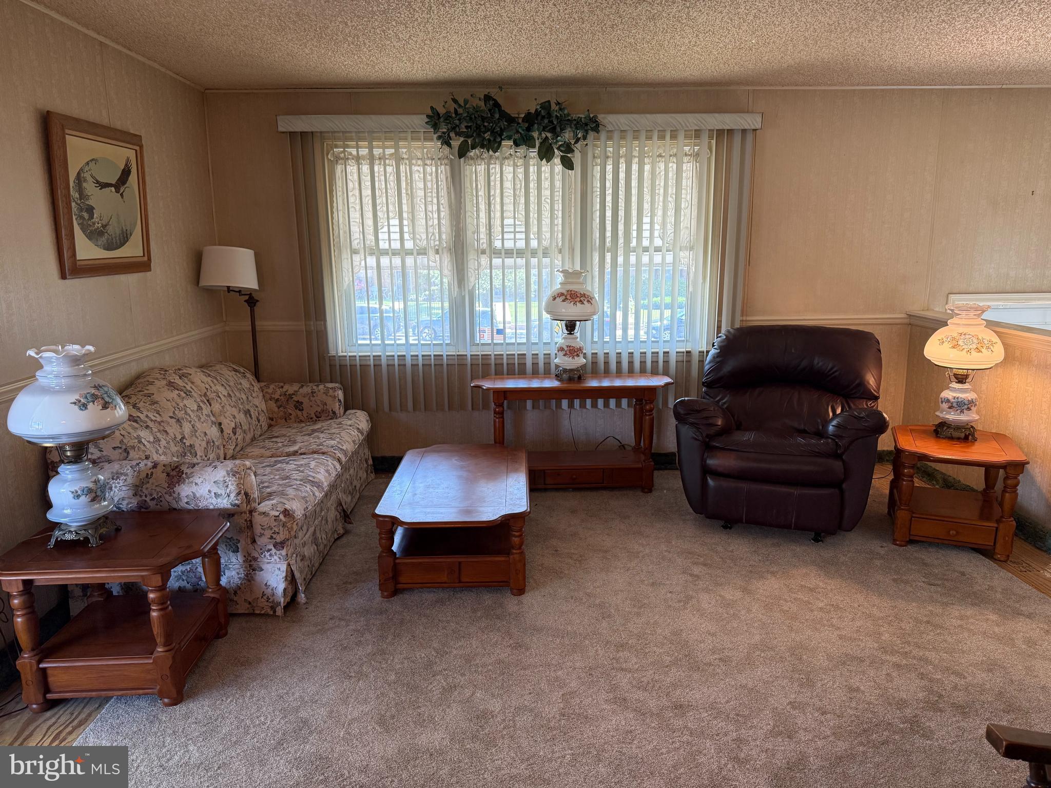 12018 Academy Road Philadelphia, PA 19154 - Photo 3 of 24 a living room with furniture and a window
