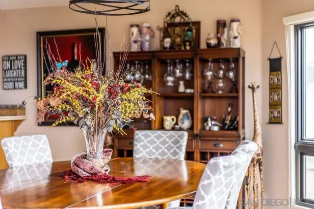 a room with lots of potted plants