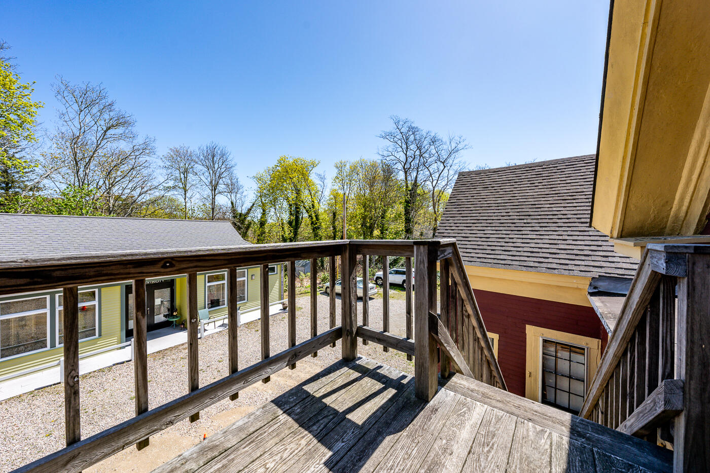 354 Main Street Wellfleet, MA 02667 - Photo 16 of 40 a view of balcony with wooden floor and fence