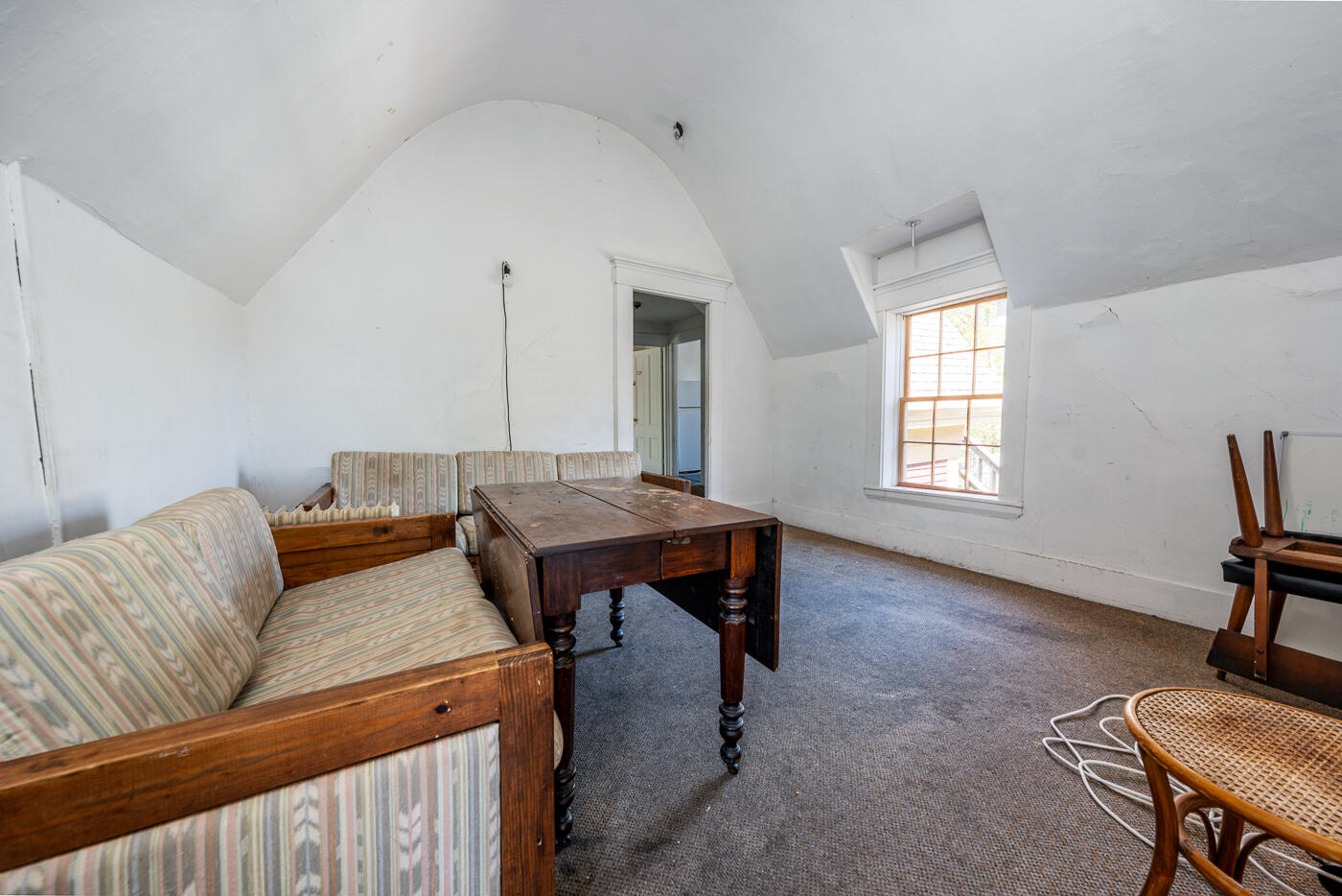 354 Main Street Wellfleet, MA 02667 - Photo 17 of 40 a living room with furniture and a window