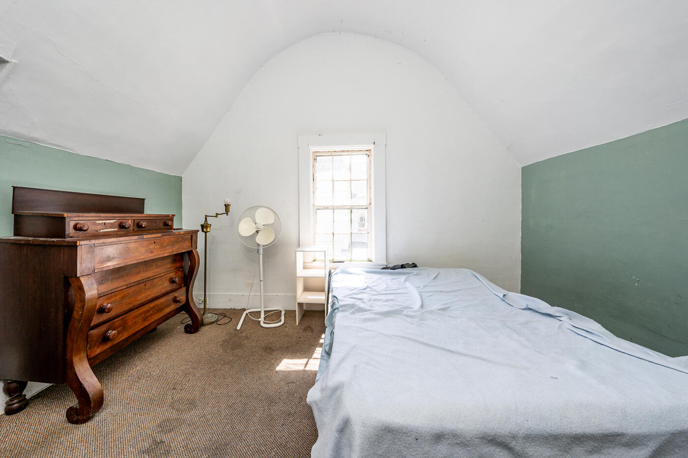 354 Main Street Wellfleet, MA 02667 - Photo 23 of 40 a bed room with a bed and a window