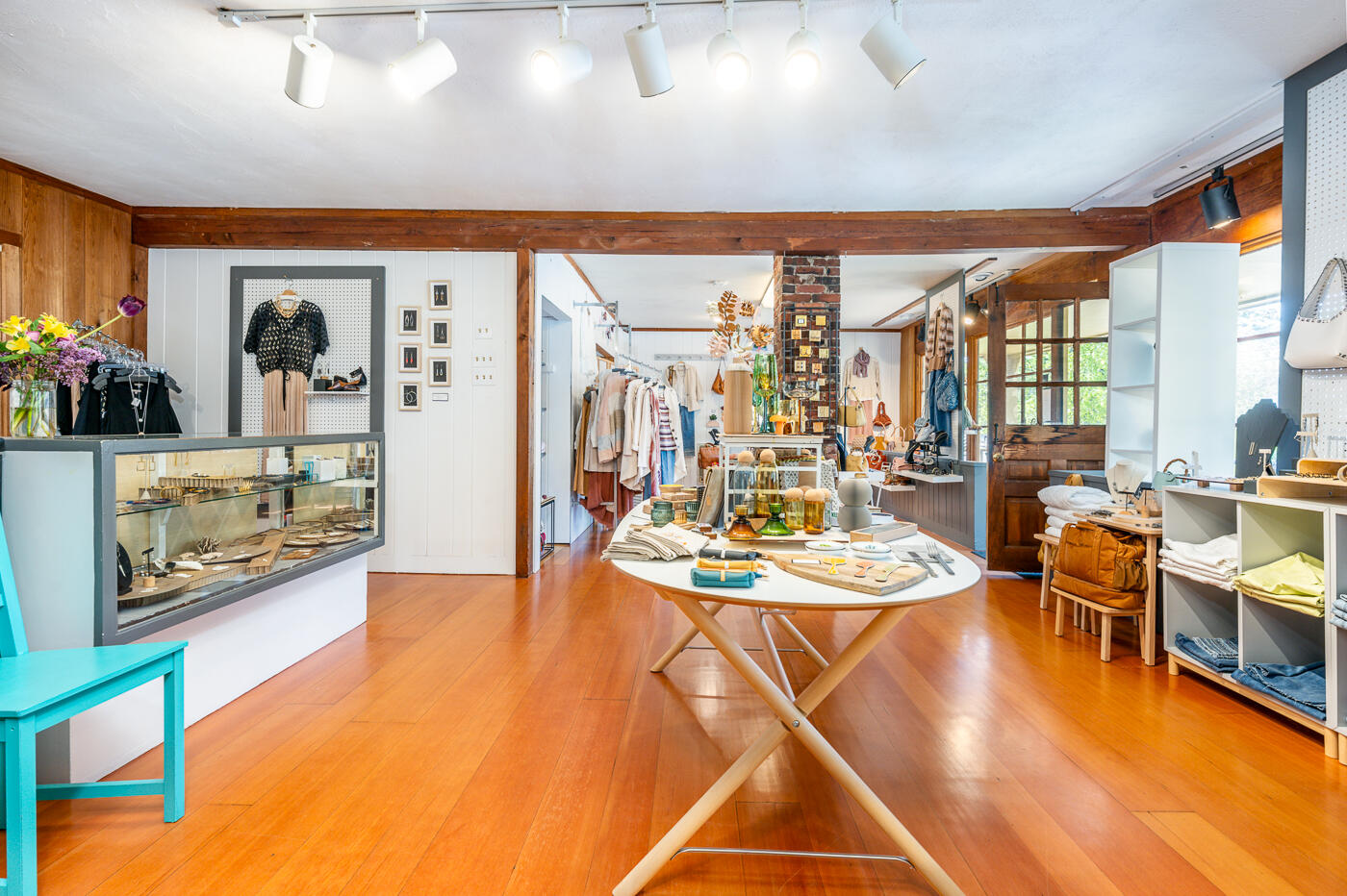 354 Main Street Wellfleet, MA 02667 - Photo 27 of 40 a dining room with large window table and chairs