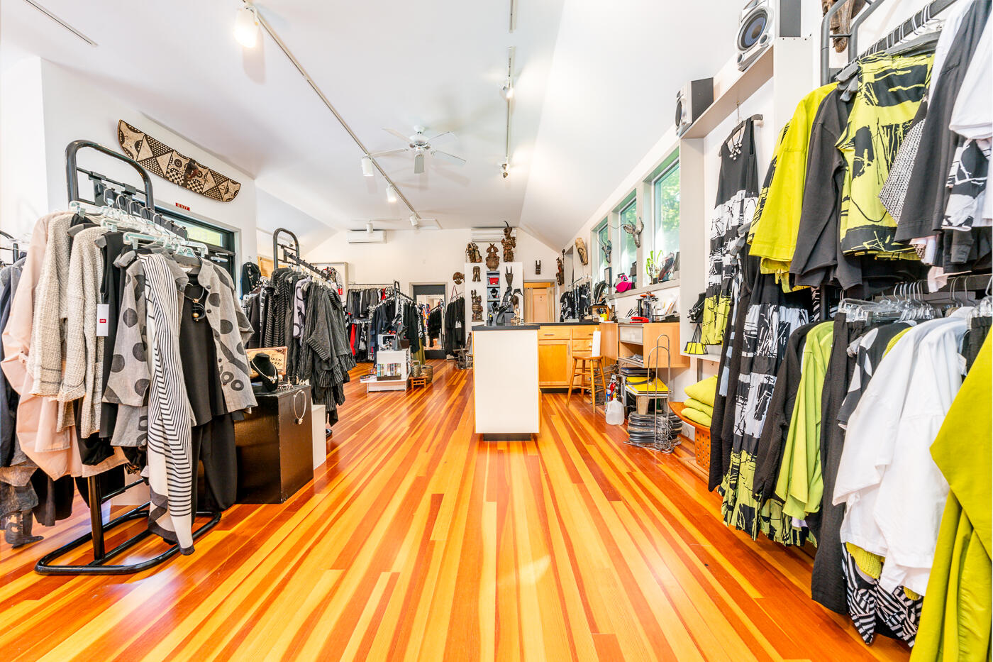 354 Main Street Wellfleet, MA 02667 - Photo 9 of 40 a view of a room with lots of different colored cloths