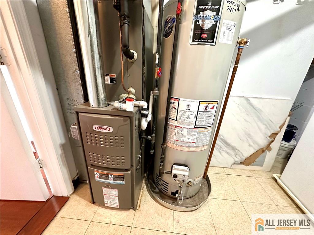 341 Wimbeldon Court North Brunswick, NJ 08902 - Photo 12 of 14 a view of washer and dryer