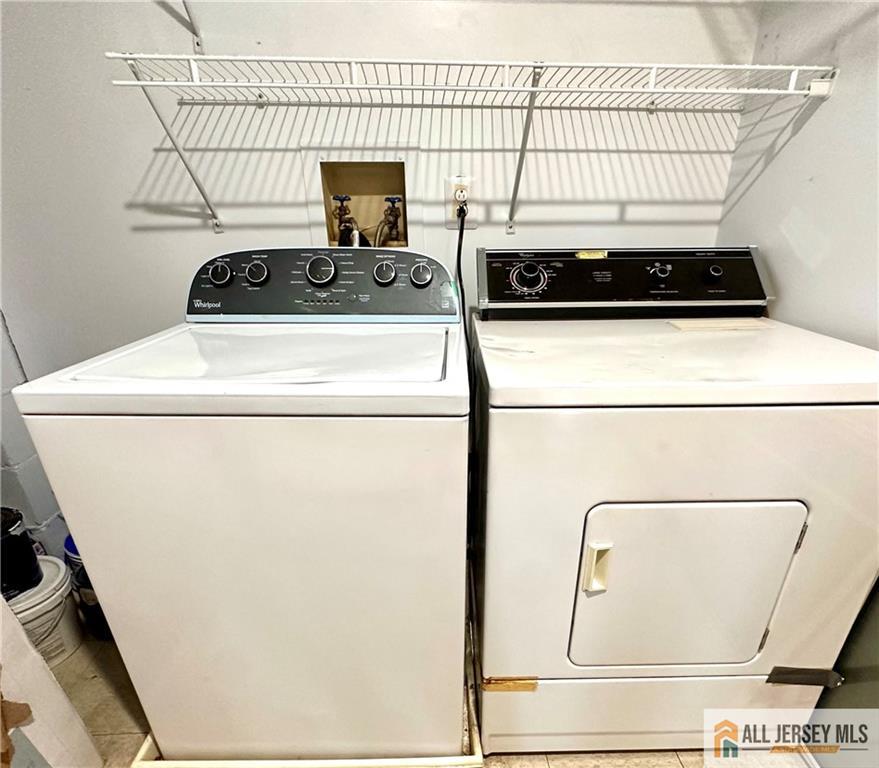 341 Wimbeldon Court North Brunswick, NJ 08902 - Photo 13 of 14 a close view of a dryer and washer
