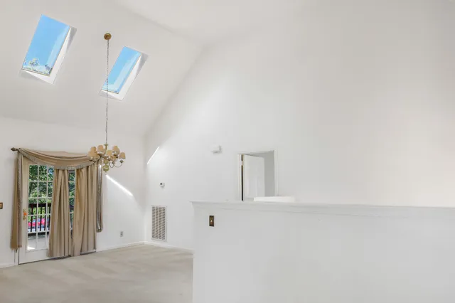 a view of a hallway with entryway