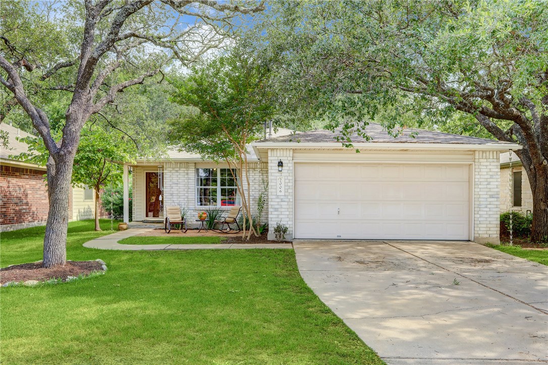 2006 Killians Way Cedar Park, TX 78613 - Photo 1 of 1 a front view of a house with a yard and sitting area