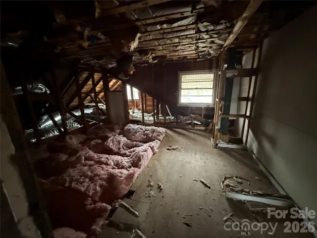 a front view of a house with a garage