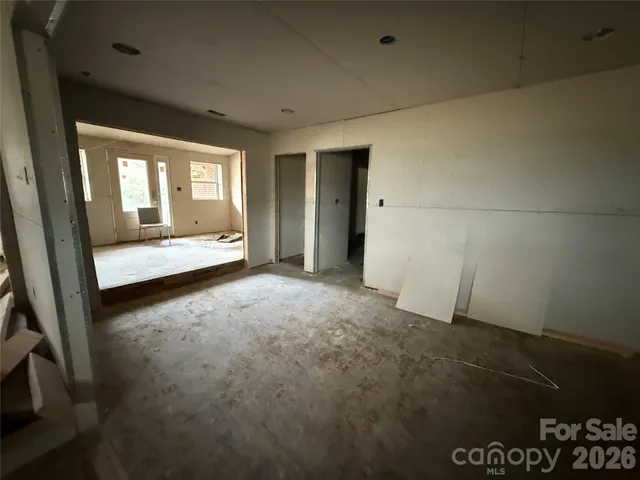 an empty room with windows