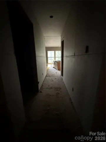 a view of entryway and hall with a window