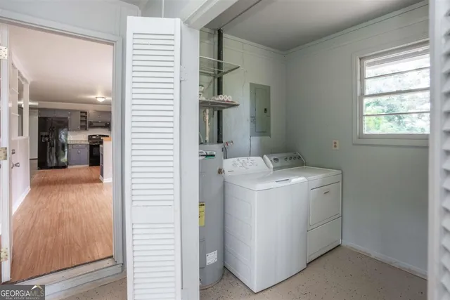 a utility room with dryer and washer
