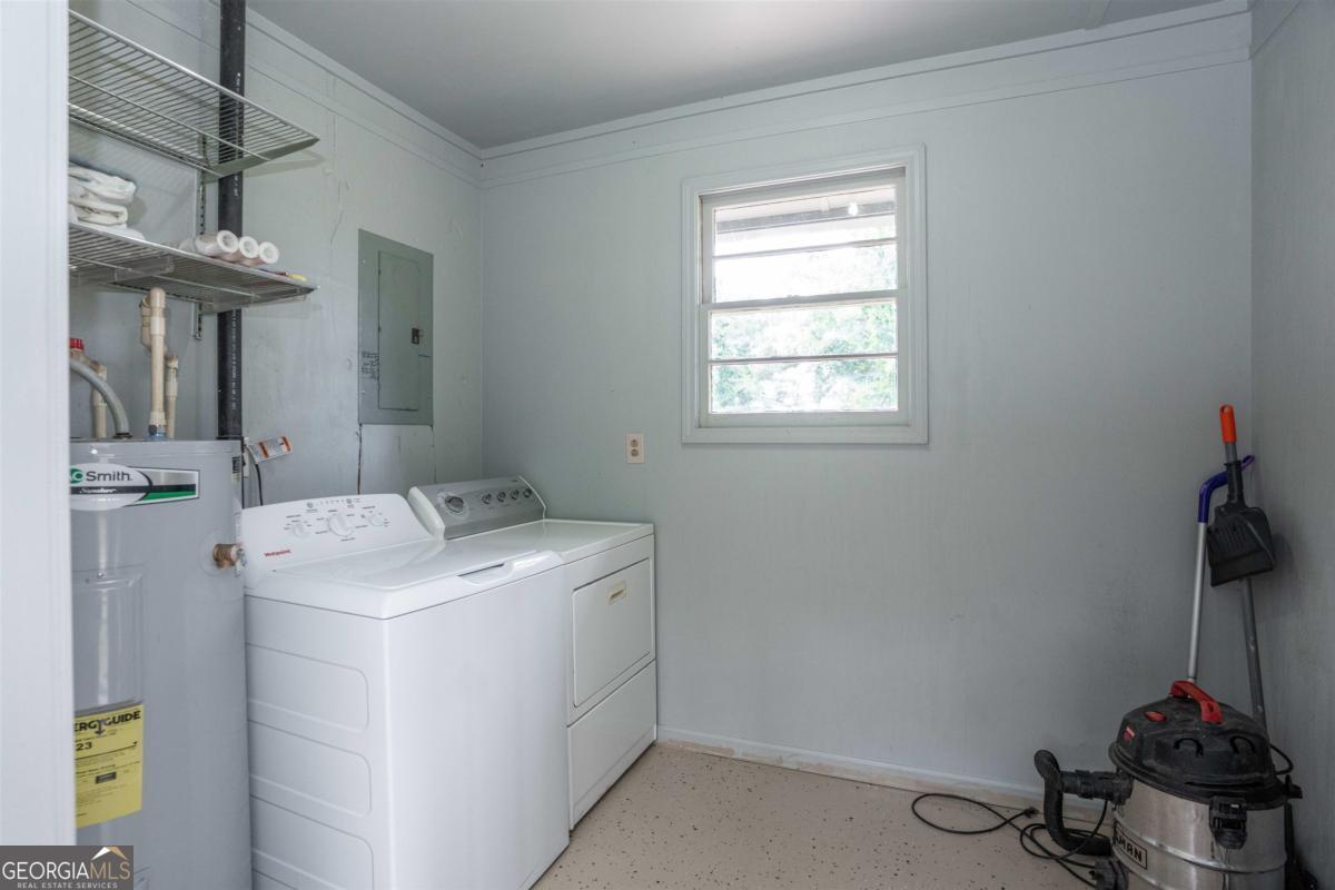 1251 Brickhouse Road Greensboro, GA 30642 - Photo 21 of 35 a room with storage and utility