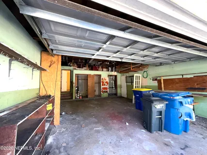 a view of a room with wooden walls