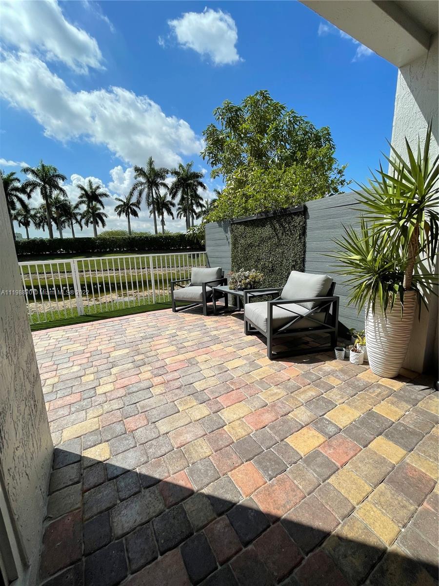 Doral Isles Doral, FL 33178 - Photo 15 of 35 a view of swimming pool with patio