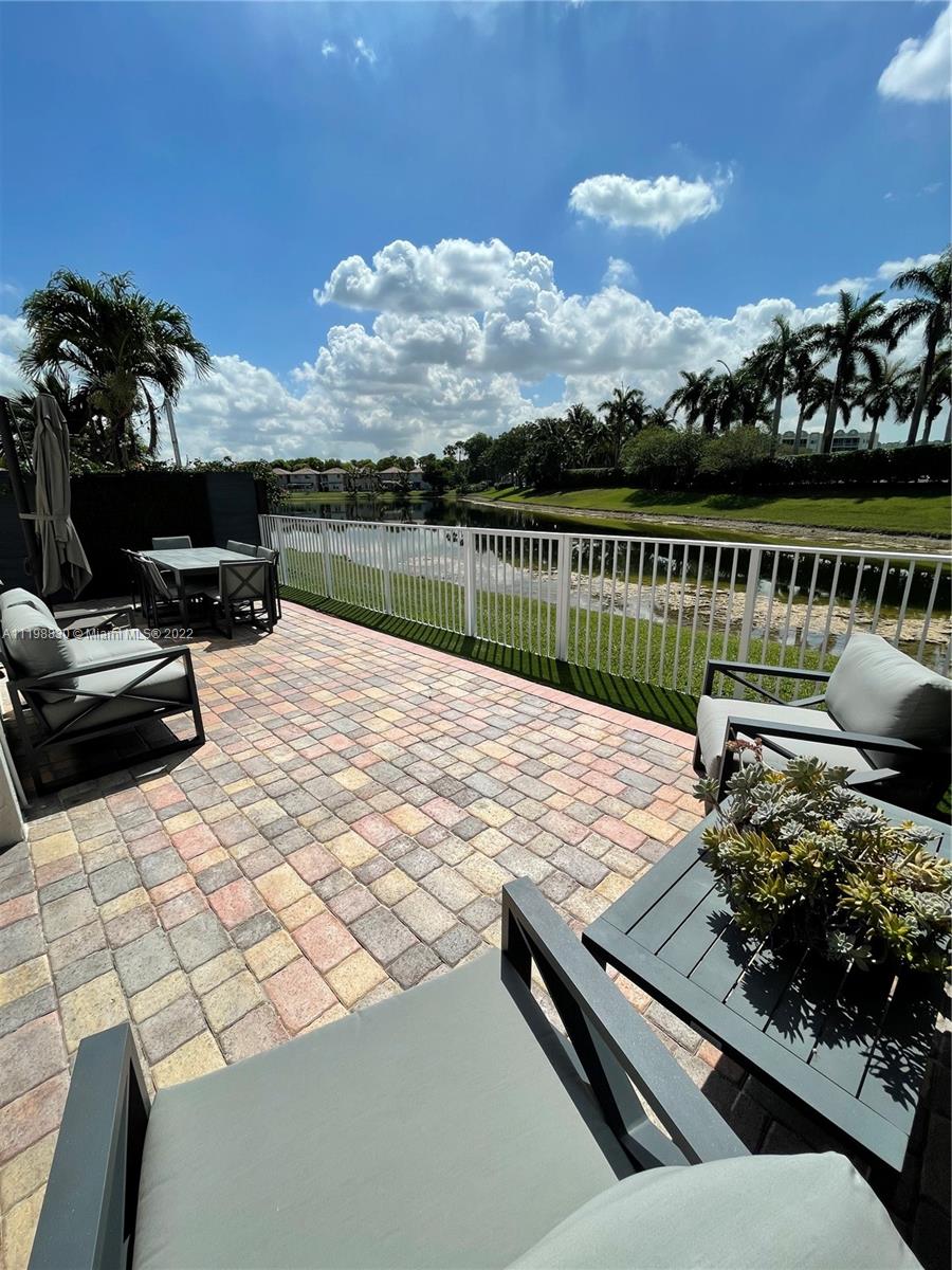 Doral Isles Doral, FL 33178 - Photo 16 of 35 a view of swimming pool with lounge chair