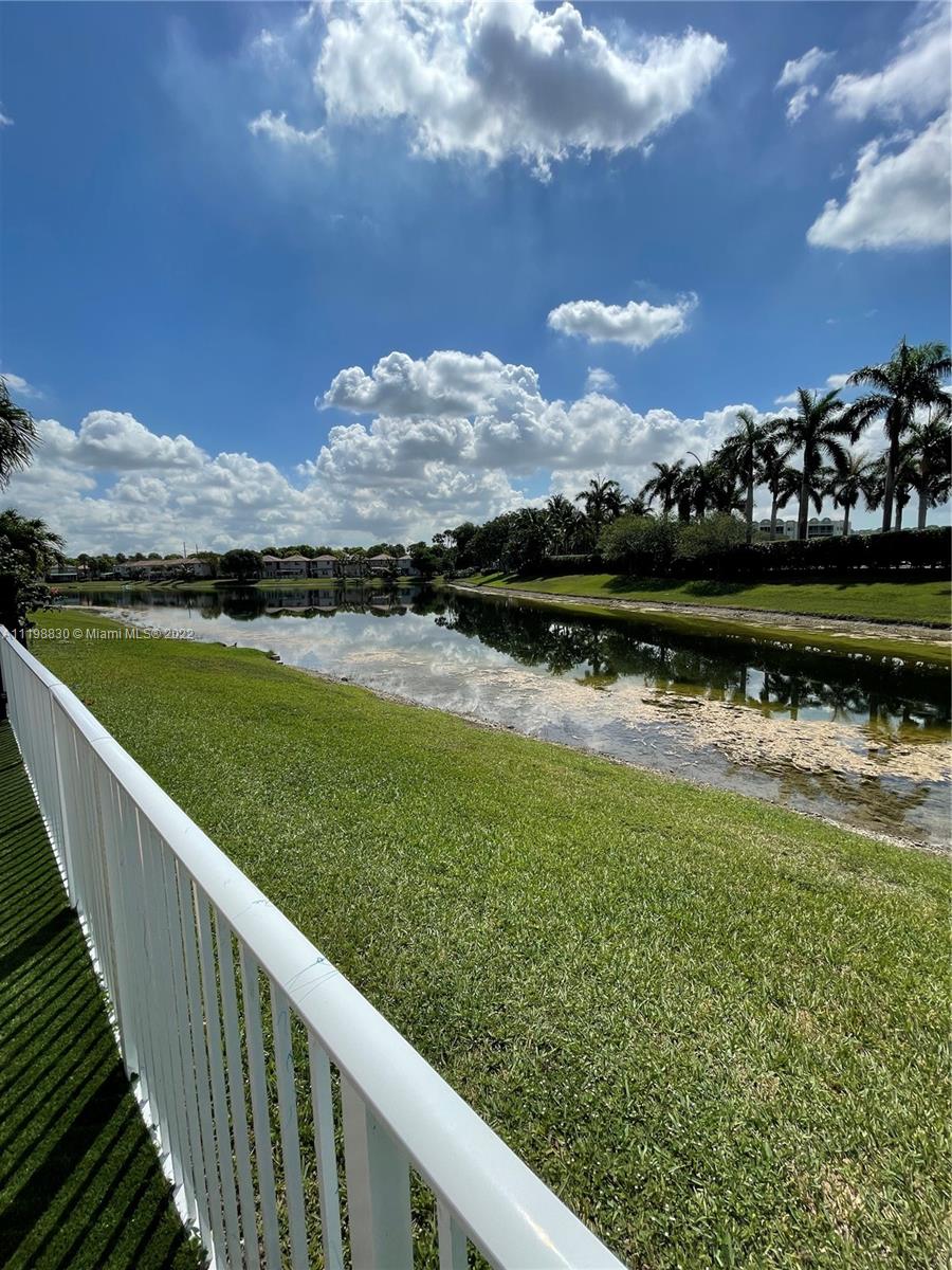 Doral Isles Doral, FL 33178 - Photo 17 of 35 a view of a lake with a city