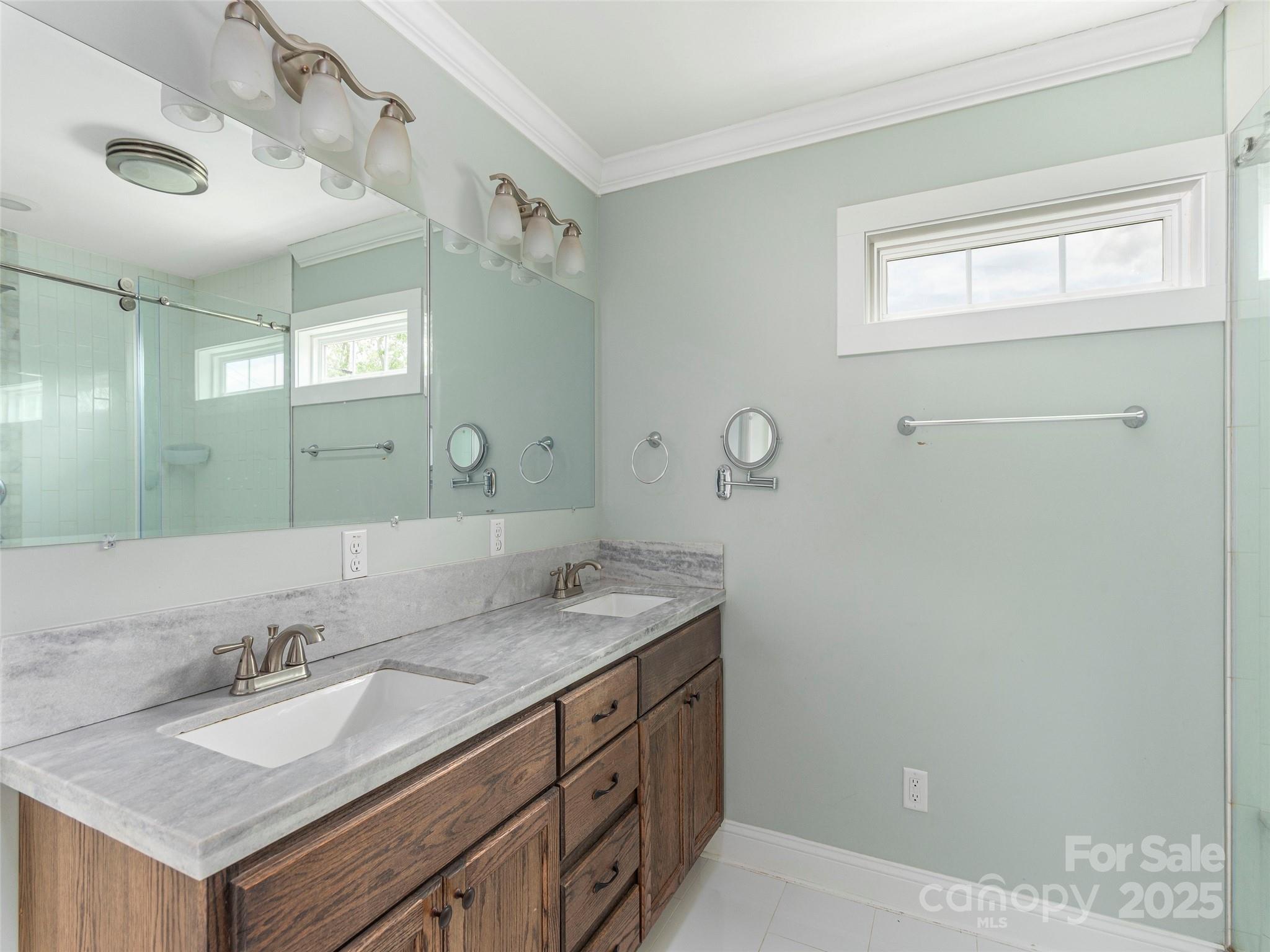 3355 Thickety Road Clyde, NC 28721 - Photo 15 of 33 a bathroom with a granite countertop sink and a mirror