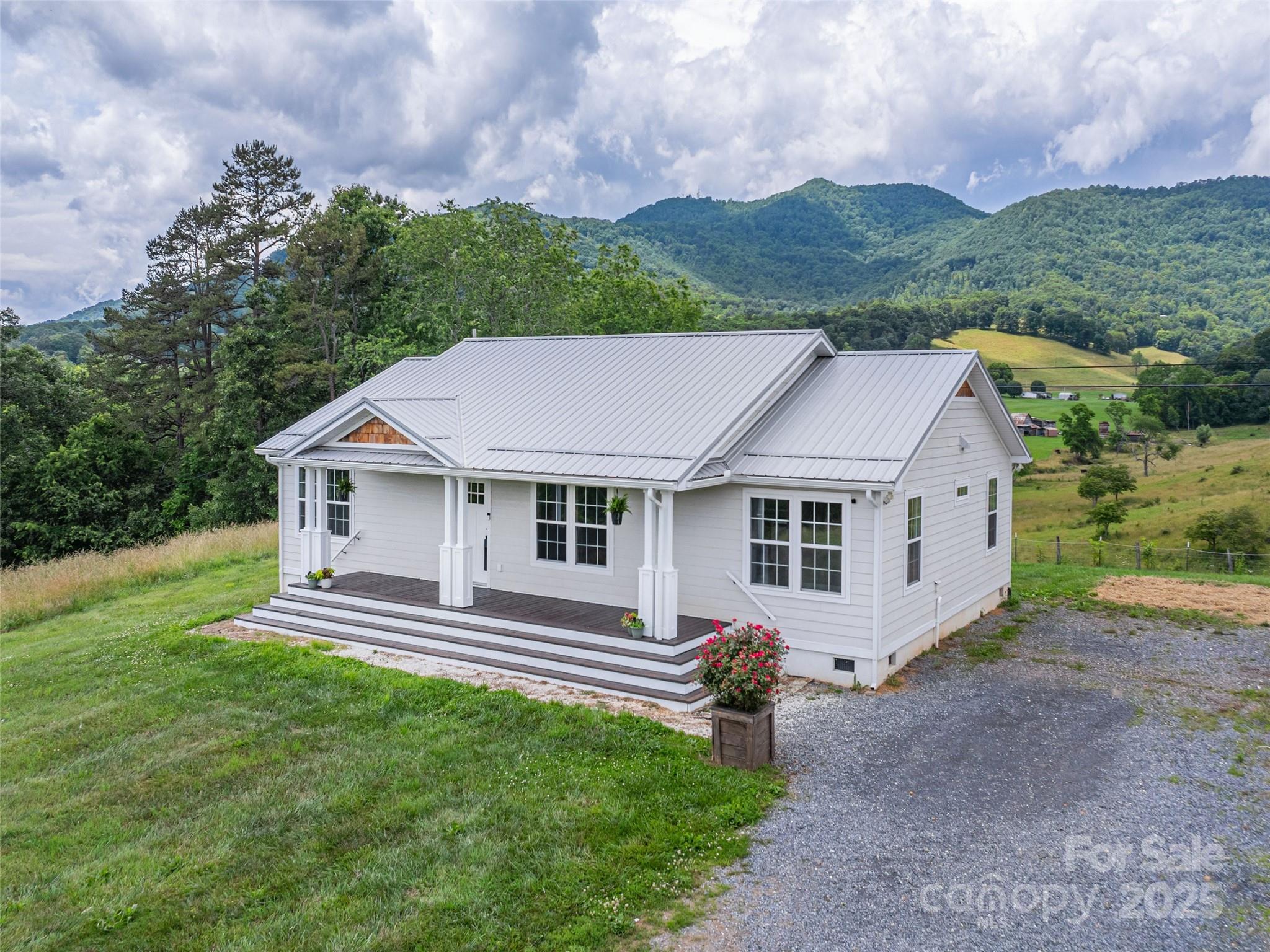 3355 Thickety Road Clyde, NC 28721 - Photo 28 of 33 a view of a house with a yard