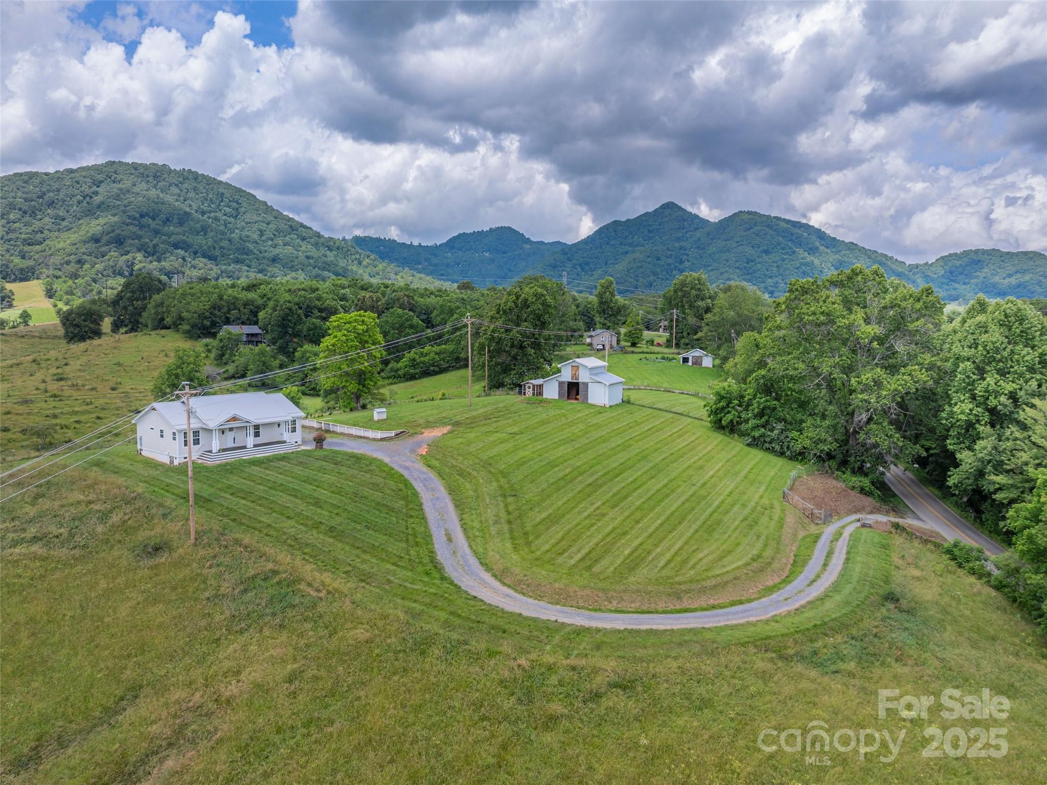 3355 Thickety Road Clyde, NC 28721 - Photo 31 of 33 a view of a golf course with a garden