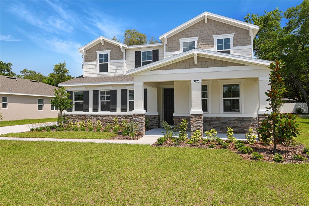 3725 Deer Rdg Drive Mount Dora, FL 32757 - Photo 1 of 23 a front view of a house with a yard