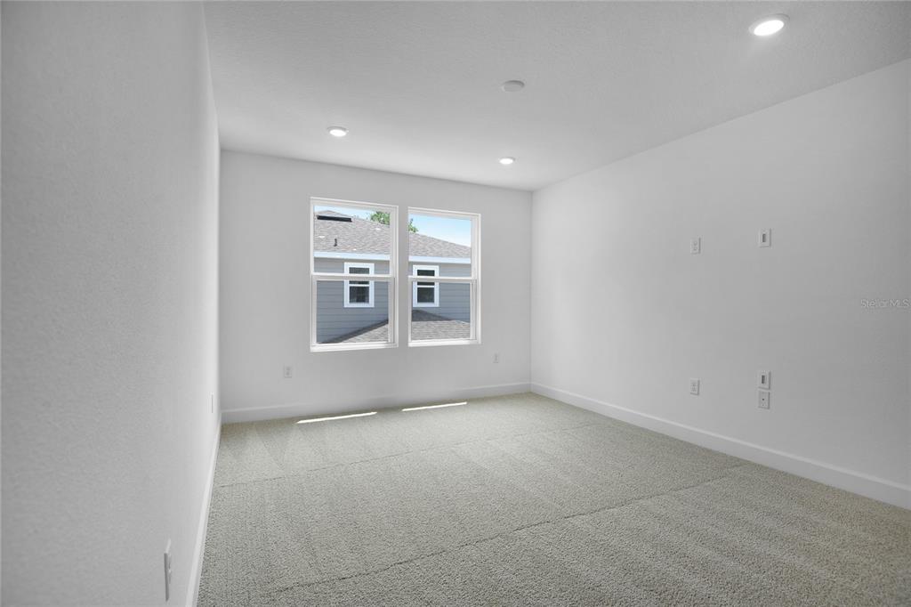 3725 Deer Rdg Drive Mount Dora, FL 32757 - Photo 14 of 23 a view of a big room with wooden floor and windows