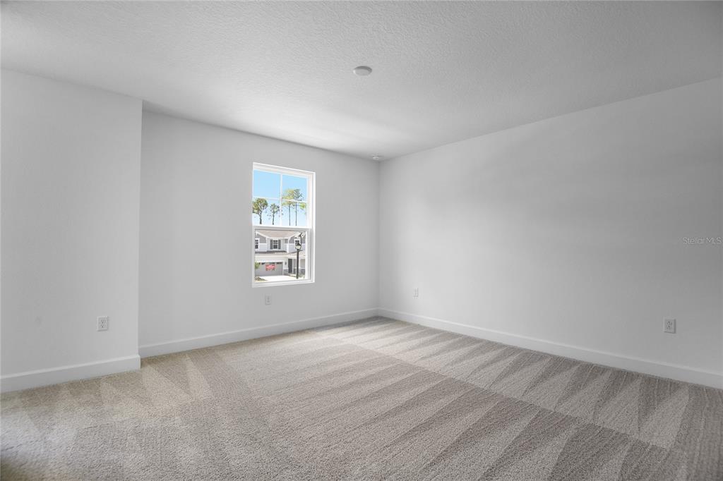 3725 Deer Rdg Drive Mount Dora, FL 32757 - Photo 19 of 23 wooden floor in an empty room with a window