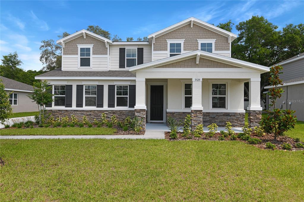 3725 Deer Rdg Drive Mount Dora, FL 32757 - Photo 2 of 23 a front view of a house with a yard