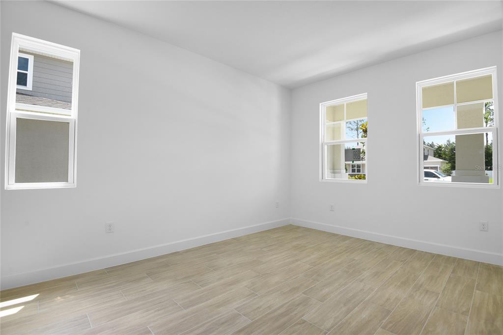 3725 Deer Rdg Drive Mount Dora, FL 32757 - Photo 9 of 23 a view of an empty room with a window