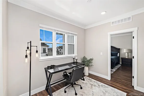 a room with furniture and a window