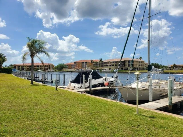 a view of a swimming pool with a lounge chair