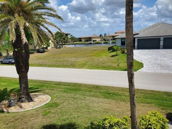 a view of a ocean with a big yard