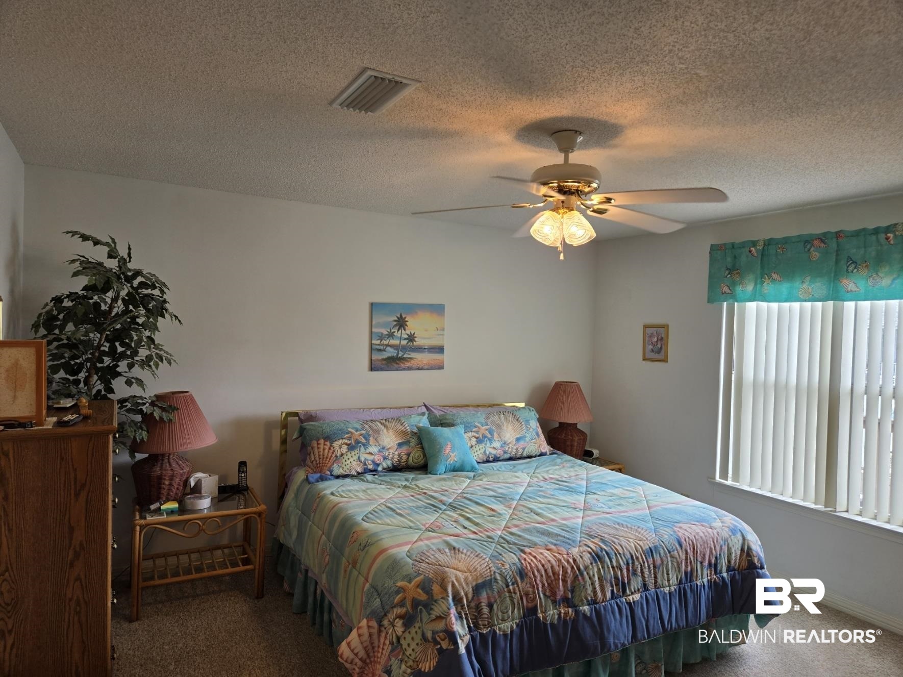 3200 Loop Road, Unit 87 Orange Beach, AL 36561 - Photo 23 of 46 Carpeted bedroom featuring a textured ceiling and ceiling fan