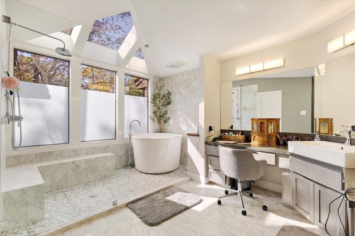 201 Vanderpool Lane, Unit 130 Houston, TX 77024 - Photo 15 of 23 a view of a dining room with furniture and a potted plant