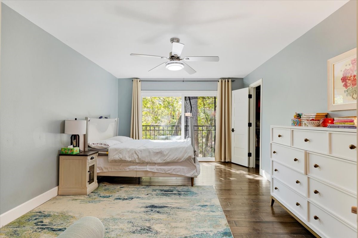 201 Vanderpool Lane, Unit 130 Houston, TX 77024 - Photo 17 of 23 a living room with furniture and wooden floor