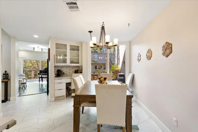 a room with table and workspace