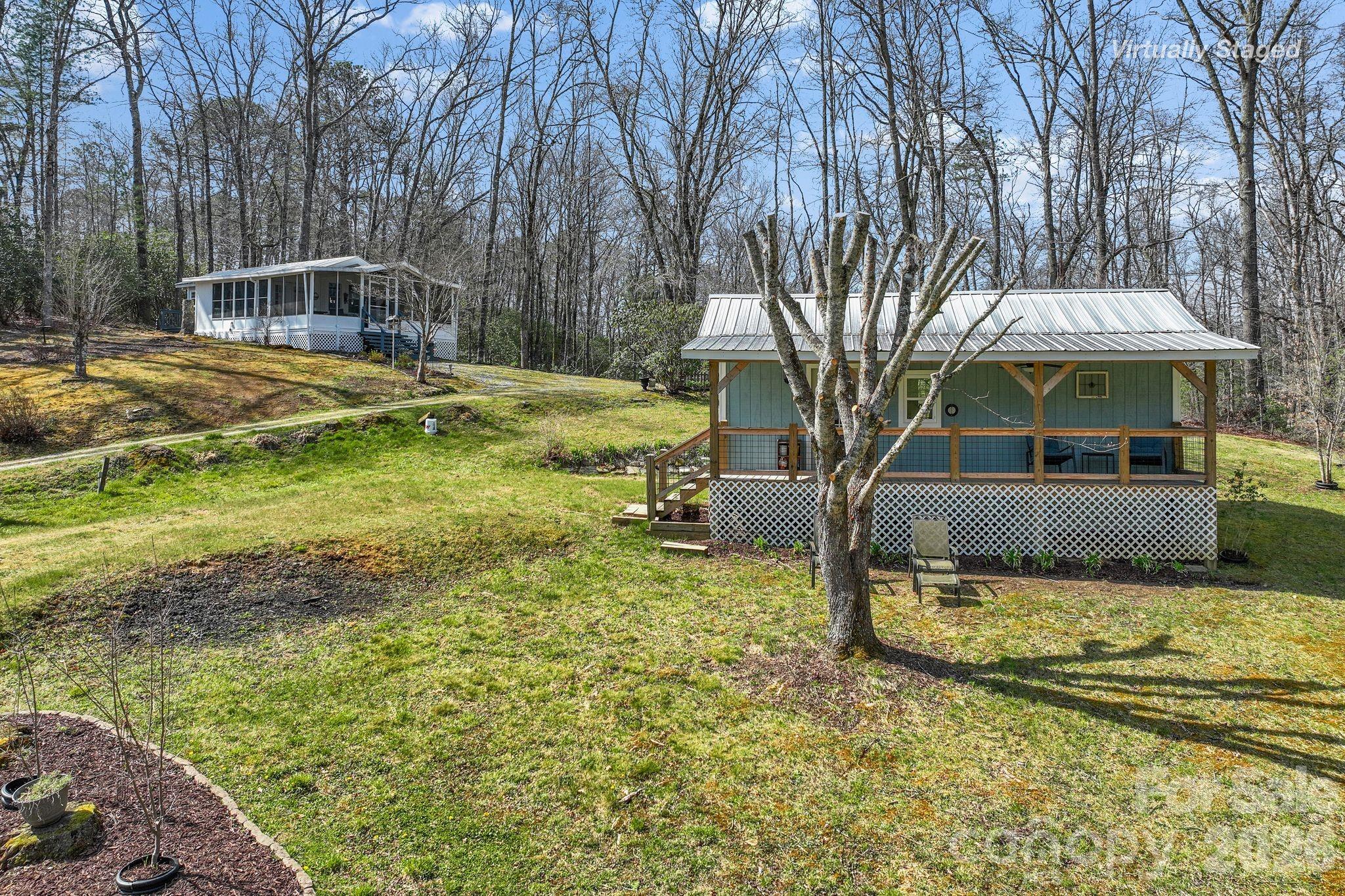 a view of a house with backyard