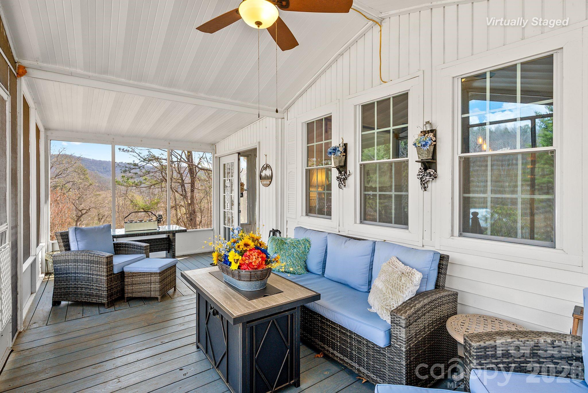 54 South Kimiko Lane Balsam Grove, NC 28708 - Photo 13 of 46 a outdoor living space with furniture and a flat screen tv
