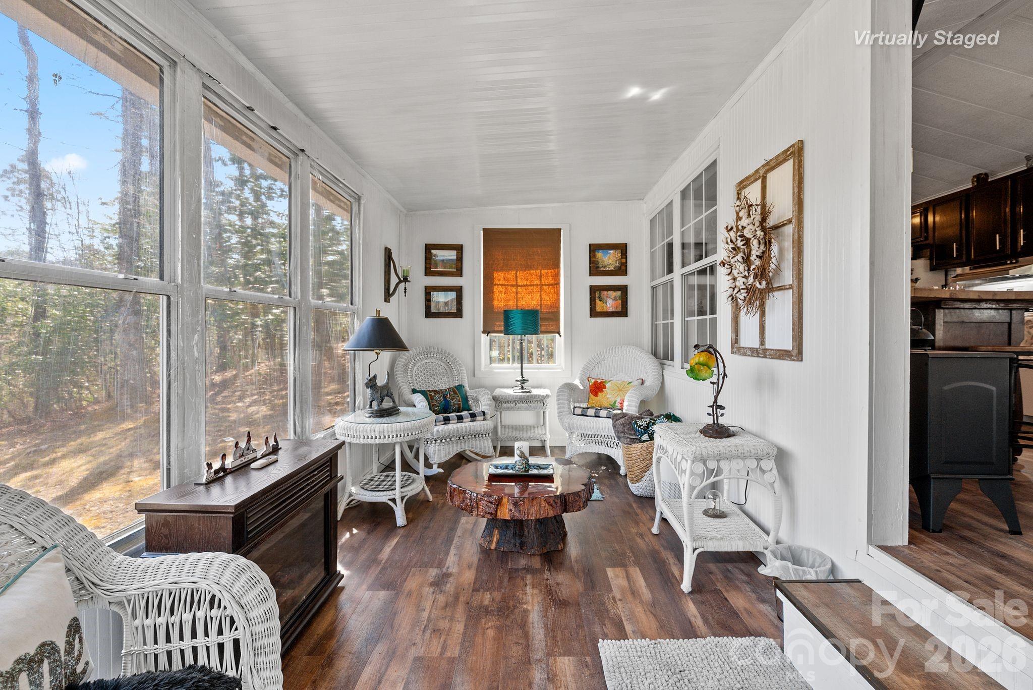 54 South Kimiko Lane Balsam Grove, NC 28708 - Photo 16 of 46 a living room with furniture and wooden floor