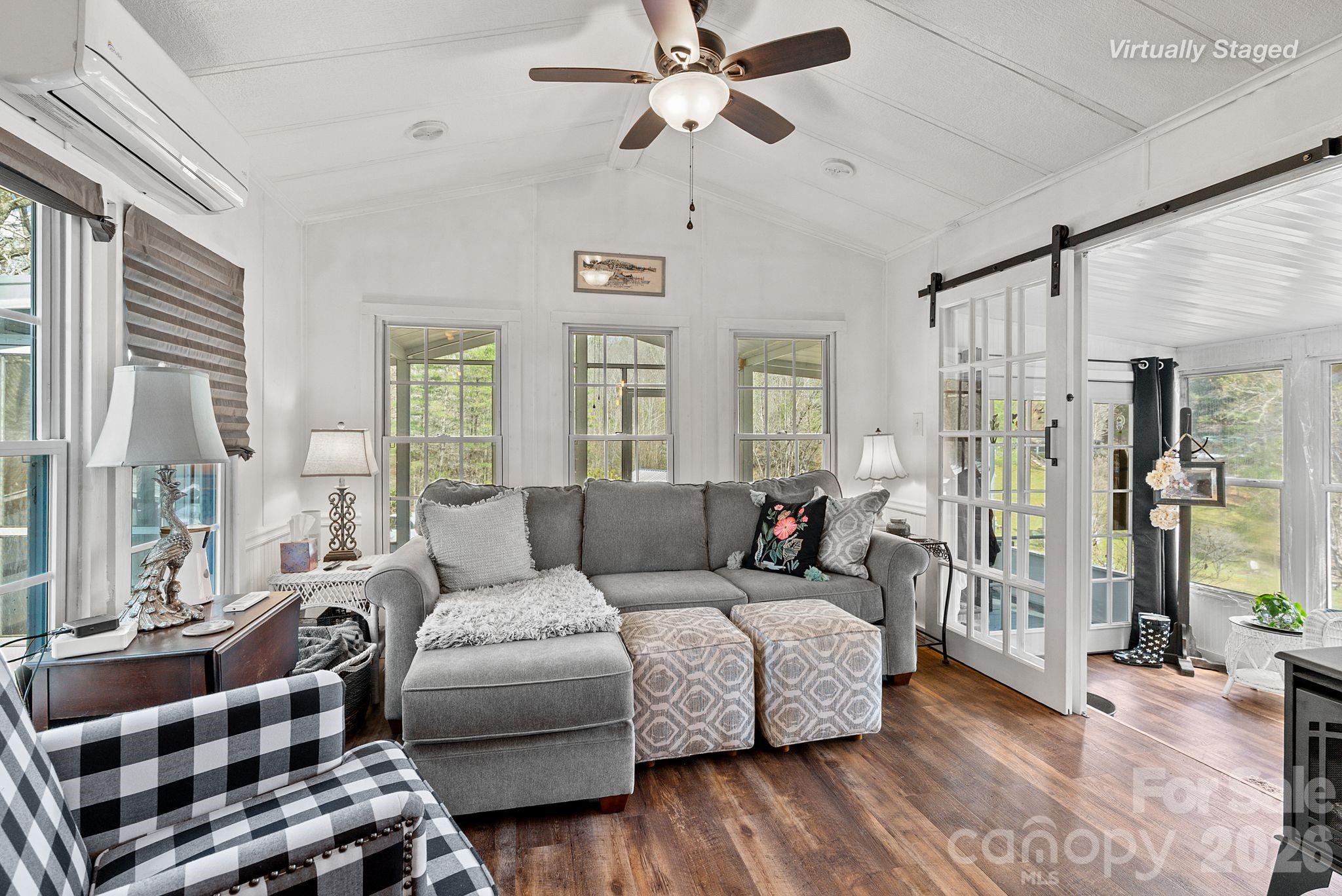 54 South Kimiko Lane Balsam Grove, NC 28708 - Photo 19 of 46 a living room with furniture and a window