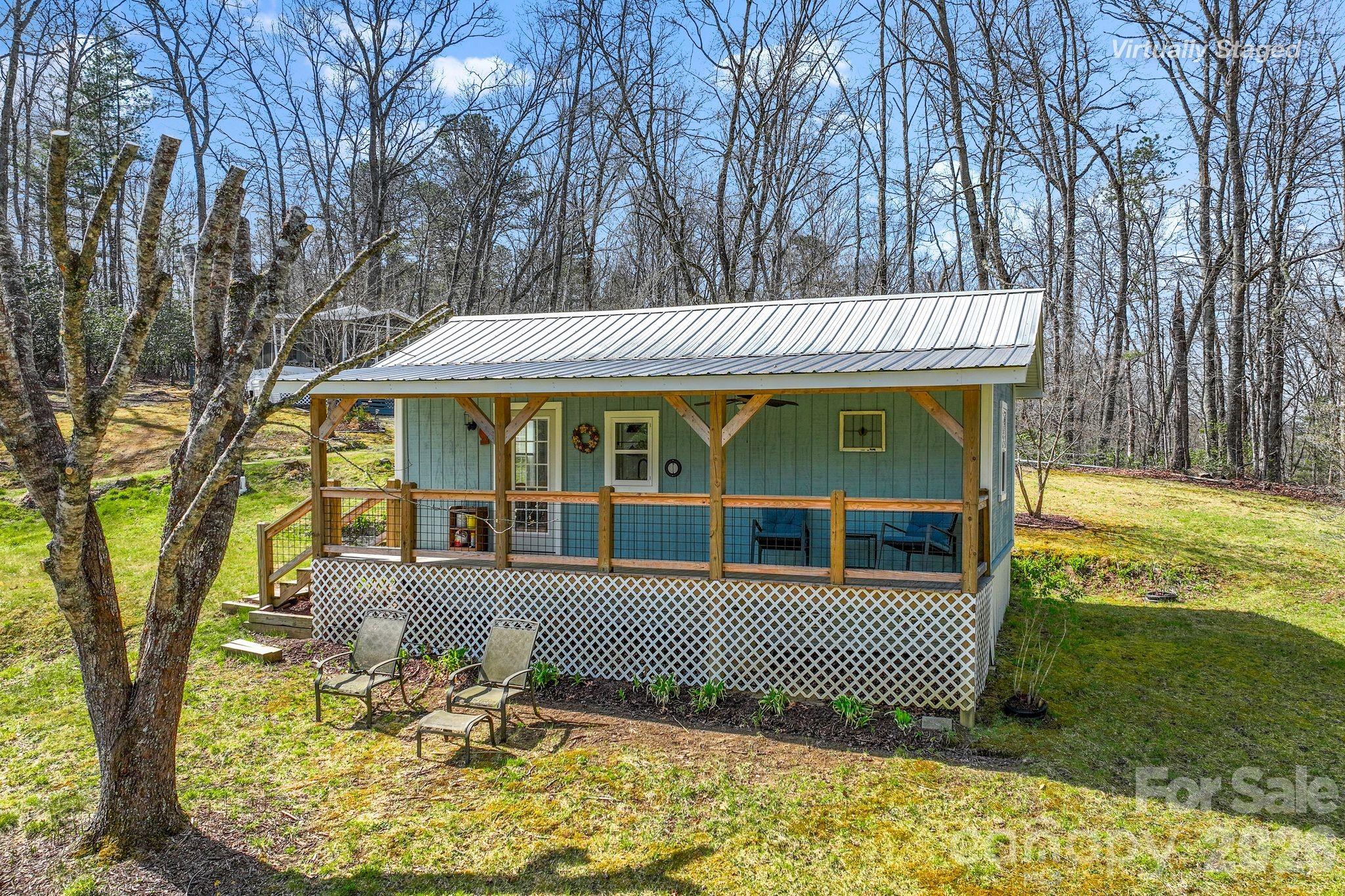 54 South Kimiko Lane Balsam Grove, NC 28708 - Photo 2 of 46 a view of a house with a yard